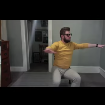 Nick Cendese teaches Music in Motion from a chair
