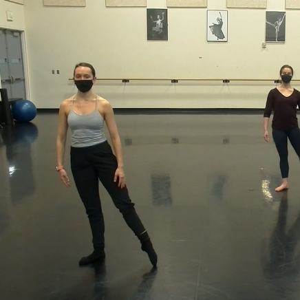 Elle demonstrates a tendu in teaching Modern I