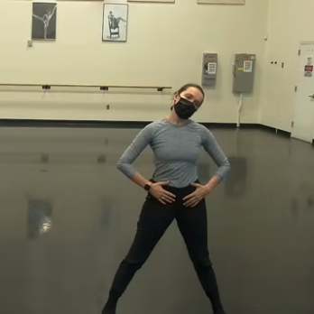 Elle teaches Jazz dance. Hands on hips