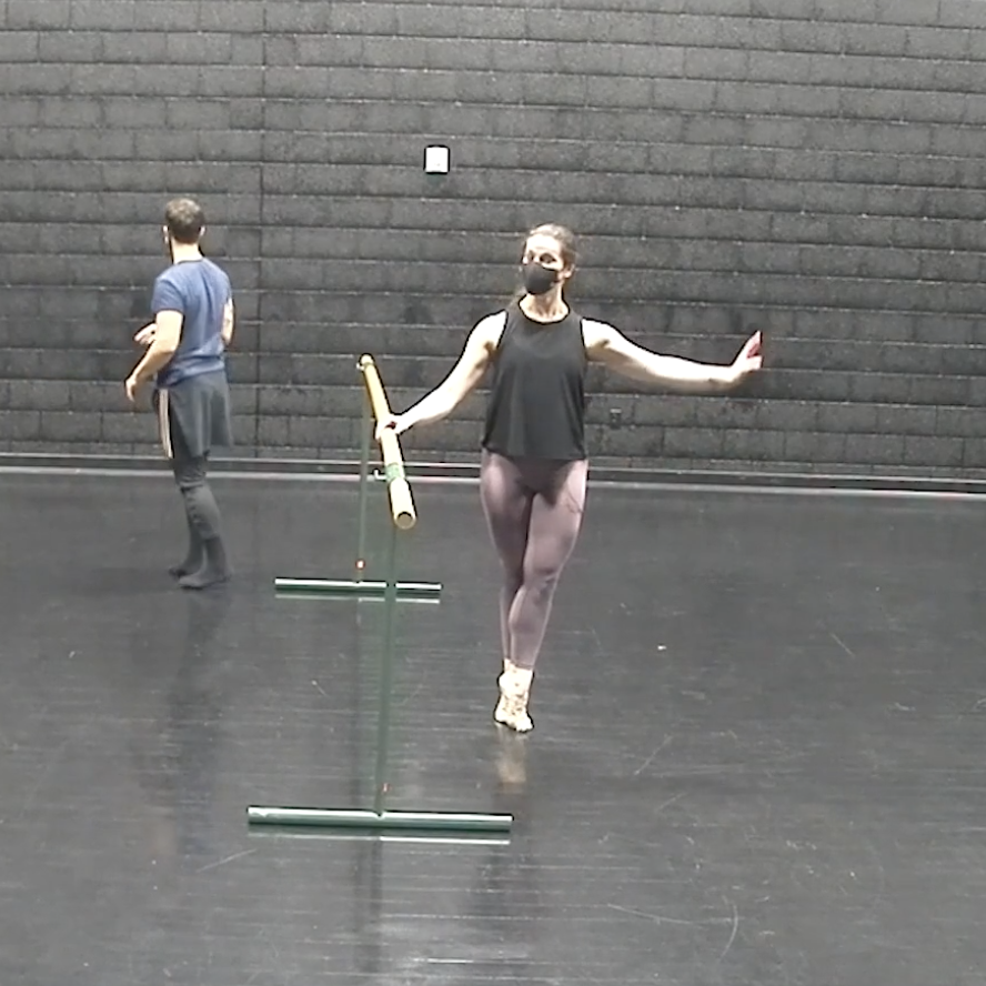 Lauren stands at the barre teaching Ballet