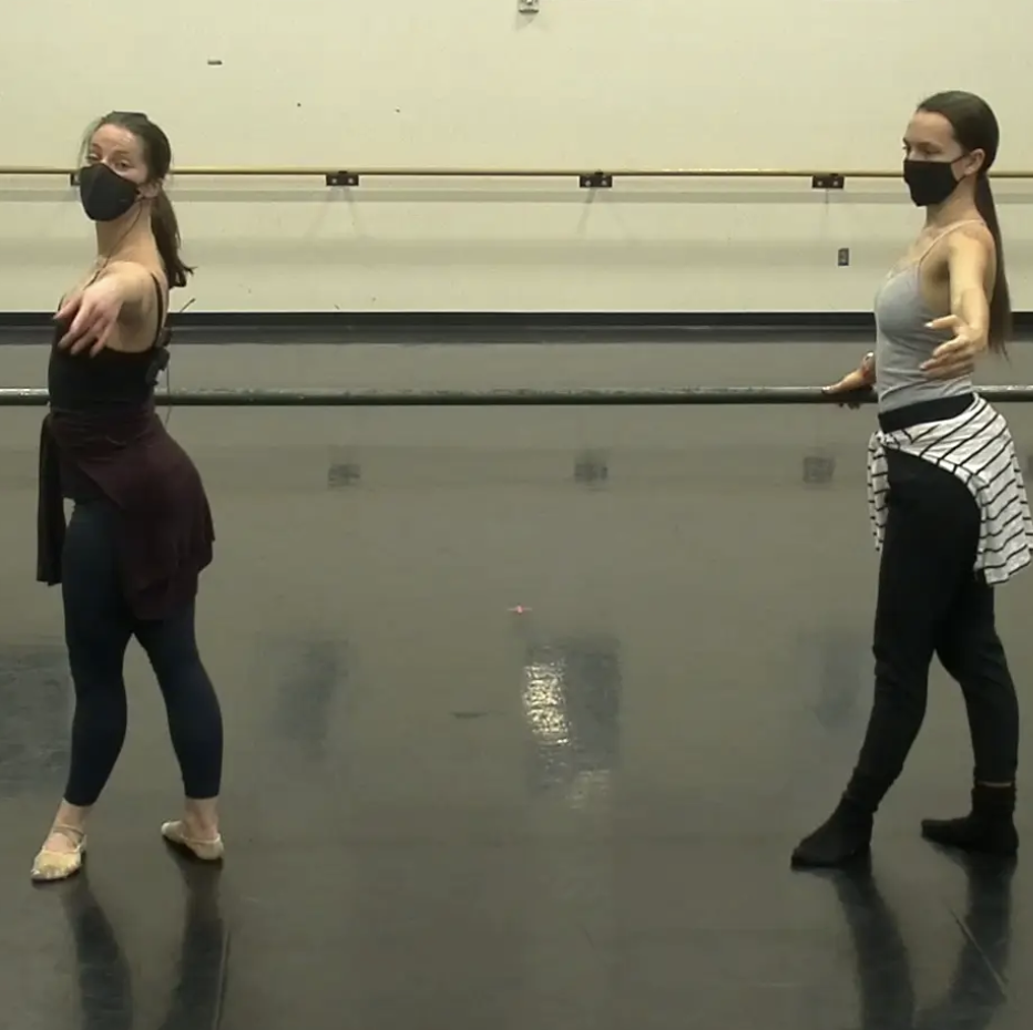Lauren and Elle stand at the barre for ballet class
